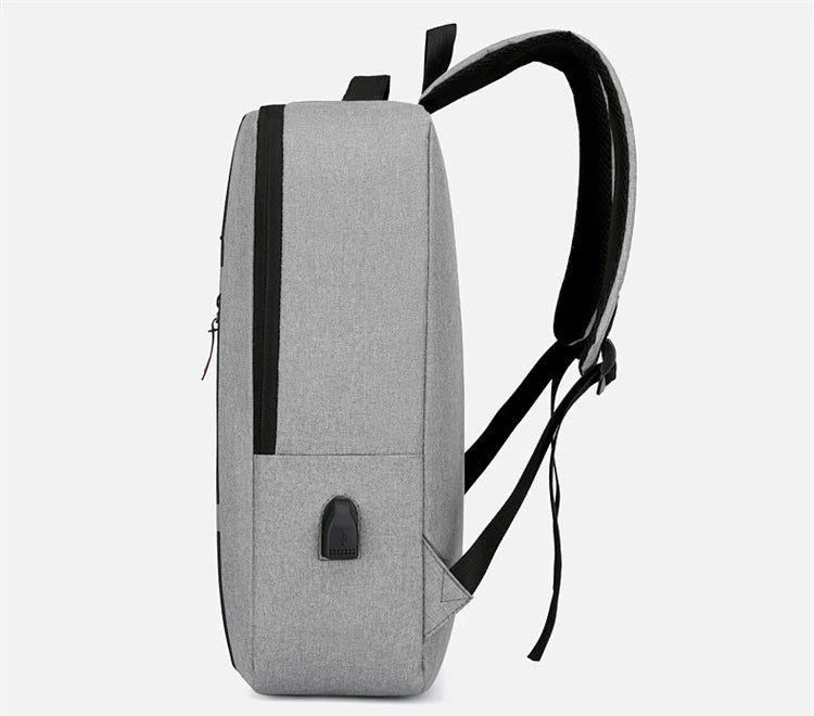 Waterproof business backpack for men, with USB port and suitable for 15.6 inch laptops, offering large storage capacity.