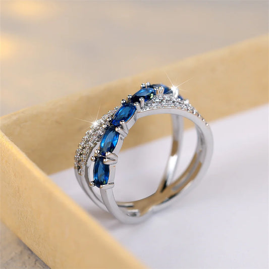 Bagues croisées en pierre ovale en cristal bleu pour femmes, bijoux de fiançailles, couleur argent, tendance, cadeaux d'anniversaire simples à la mode