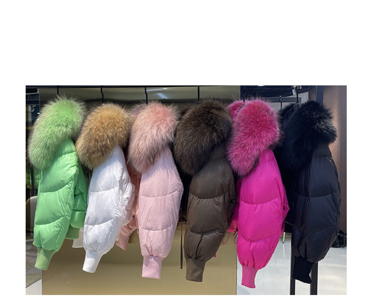 Doudoune d'hiver pour femmes avec capuche et col en fourrure naturelle