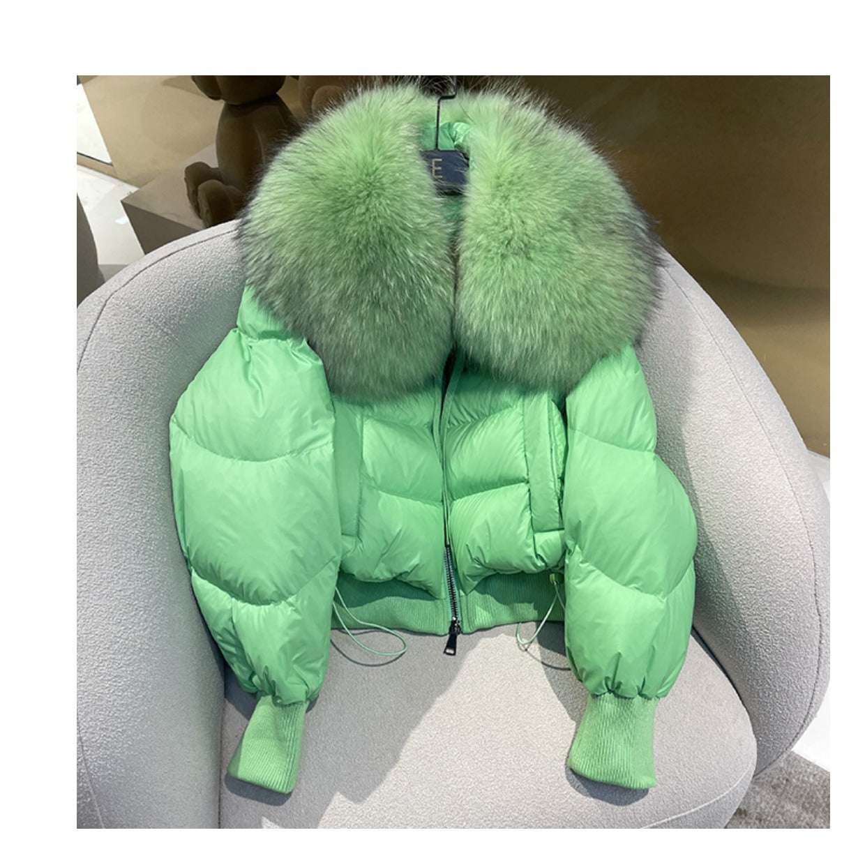 Doudoune d'hiver pour femmes avec capuche et col en fourrure naturelle