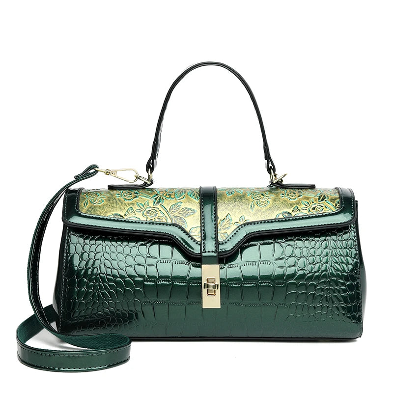 Nouveaux arrivages : Sac à main de luxe pour femmes en cuir verni avec détails floraux.