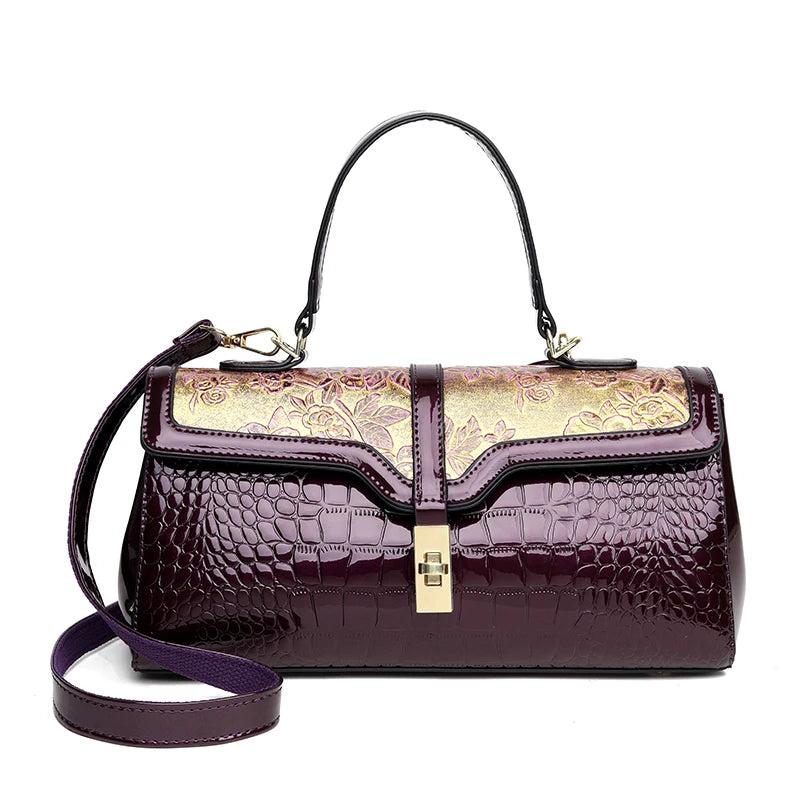 Nouveaux arrivages : Sac à main de luxe pour femmes en cuir verni avec détails floraux.